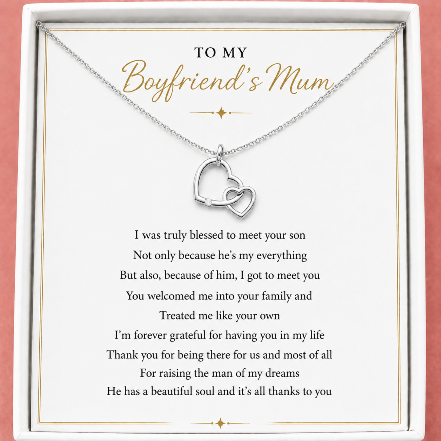 Silver heart-shaped necklace on a card with a message to 'My Boyfriend's Mum' on a pink background
