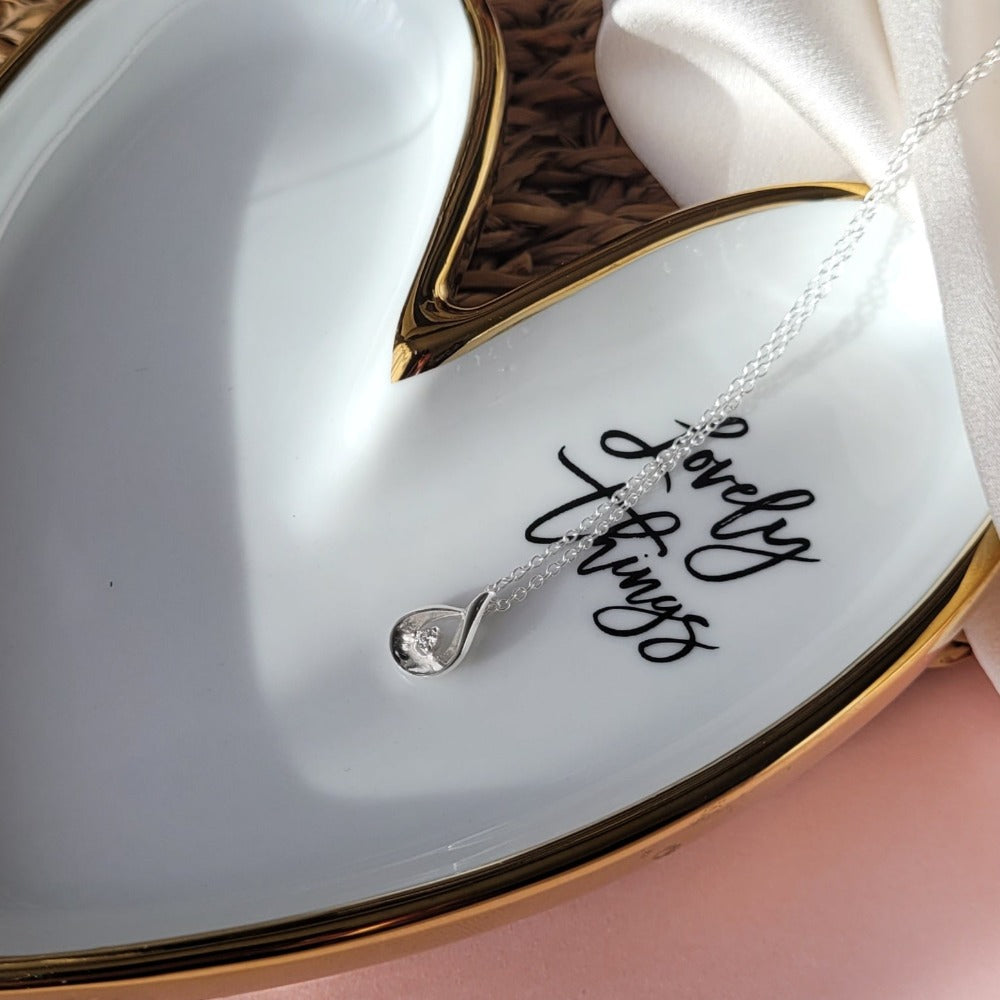 A teardrop sterling silver necklaces. A unique and meaningful gift for Mother's Day. Add a personalised message to make the gift one of-a-kind. 
